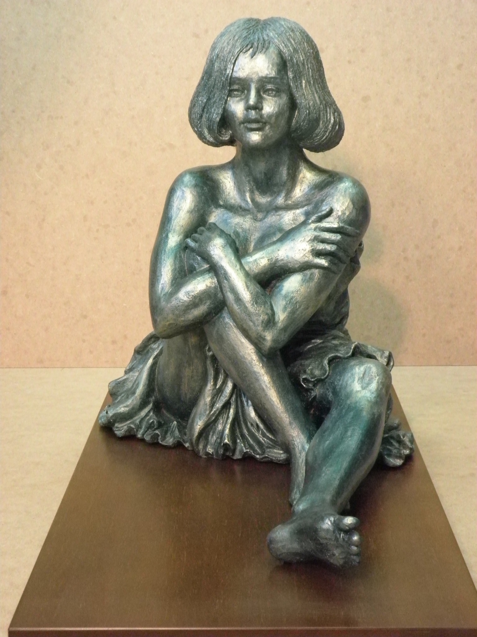 Opera figurativa con smalto bronzeo